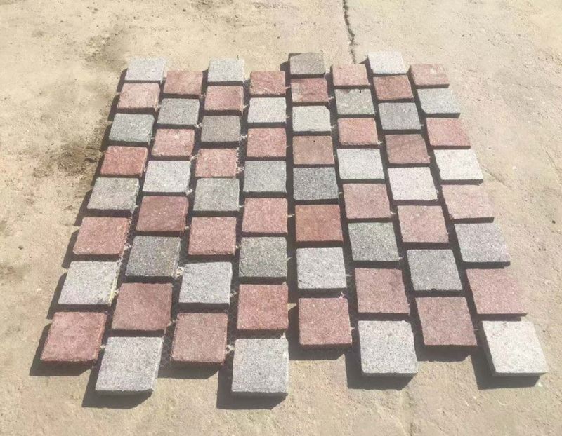 Multi color Porphyry cobbles.jpg